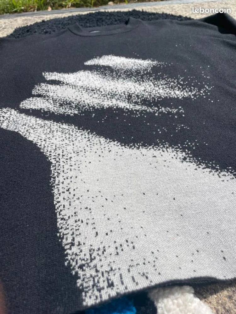 "DISTORTION" KNITTED SWEATER