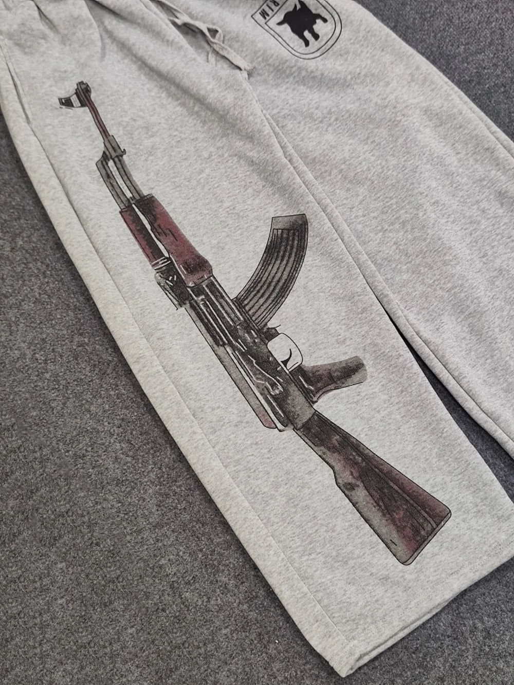 "AK-47" OVERSIZED SWEATPANTS